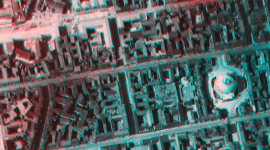 A vertical aerial photo of the city of Copenhagen, with artificial blue and red colouring to aid 3D viewing. A large domed building is visible to the right, among grids of streets.